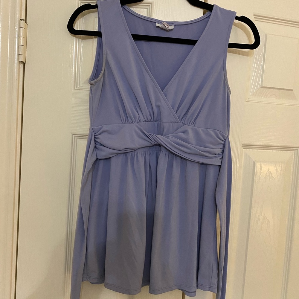 Blue/periwinkle sleeveless maternity top. Gently used. No flaws